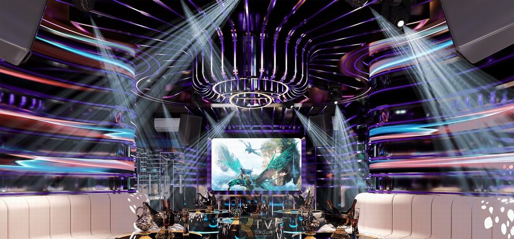 Thiết kế phòng karaoke hiện đại với trần LED vòng tròn, ánh sáng sân khấu và màn hình lớn tạo không gian karaoke sang trọng ấn tượng" 