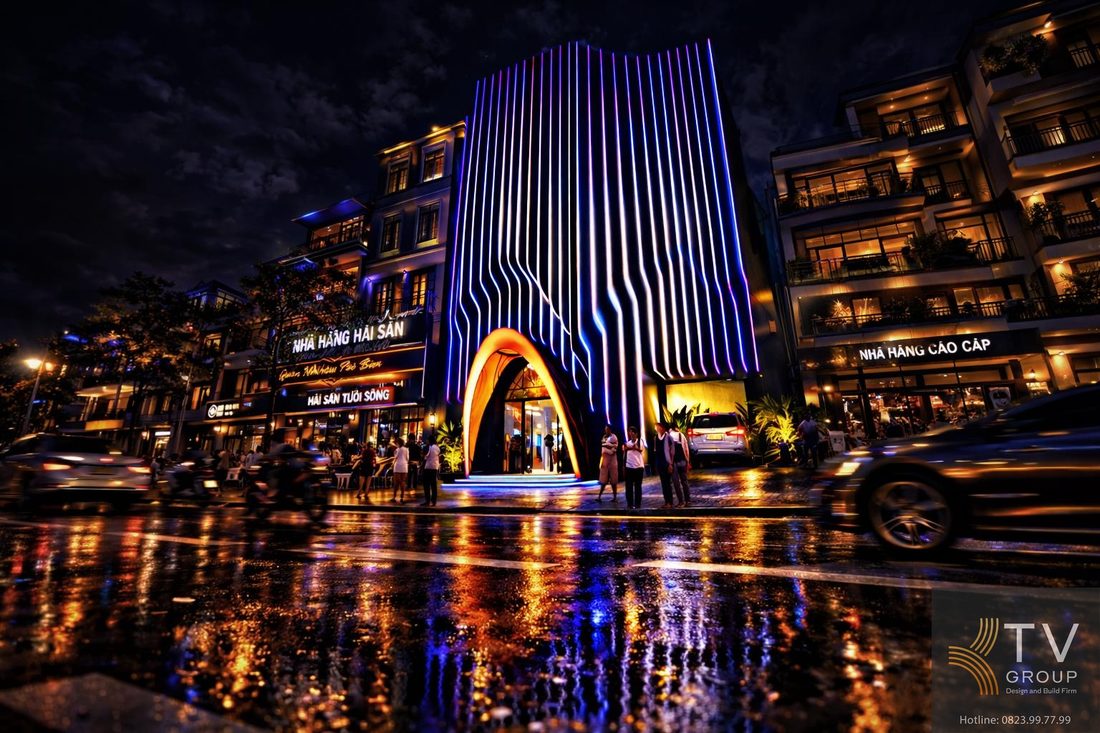 Lối vào KTV với cổng vòm ánh sáng nổi bật, bậc tam cấp dẫn hướng, thiết kế mở dễ tiếp cận, tạo điểm nhấn thu hút khách và nâng cao trải nghiệm khi tiếp cận công trình ban đêm. 