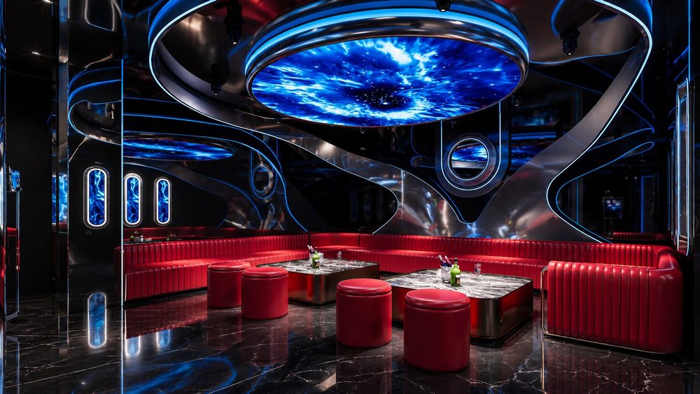 Thiết kế phòng Karaoke VIP Futuristic với trần LED Galaxy 3D, nội thất sofa đỏ cao cấp, bàn đá sang trọng, hệ thống ánh sáng thông minh và không gian giải trí đẳng cấp do KTV GROUP thiết kế thi công.