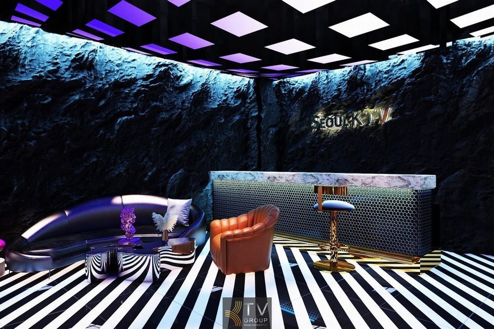 Thiết kế sảnh lễ tân karaoke Seoul KTV phong cách Futuristic Luxury với quầy bar đá và vách đá nghệ thuật