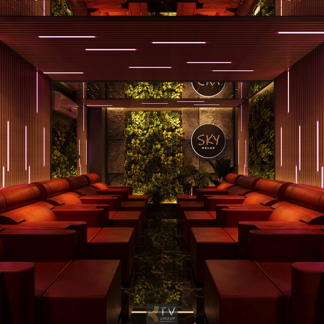 Góc lounge chờ trung tâm dự án thiết kế thi công setup massage cao cấp với sofa dài, ánh sáng ấm, mảng xanh thư giãn, không gian trải nghiệm sang trọng