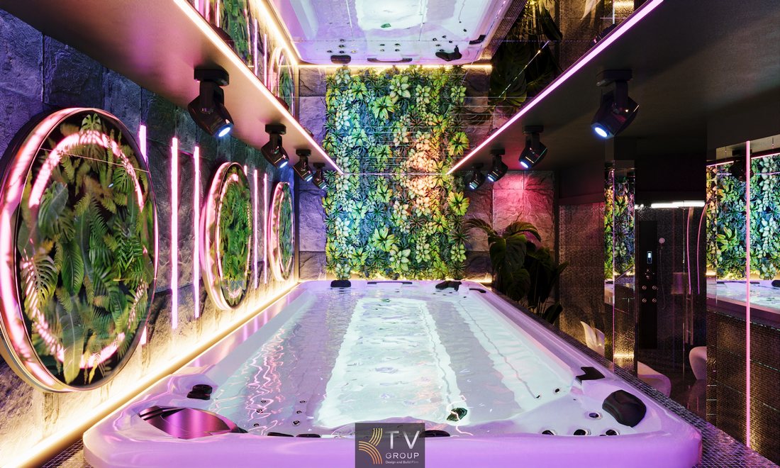 Thiết kế hồ ngâm Spa Massage cao cấp với mảng xanh trang trí, đá tự nhiên, đèn LED nghệ thuật, không gian thư giãn sang trọng, phù hợp mô hình spa dịch vụ cao cấp.