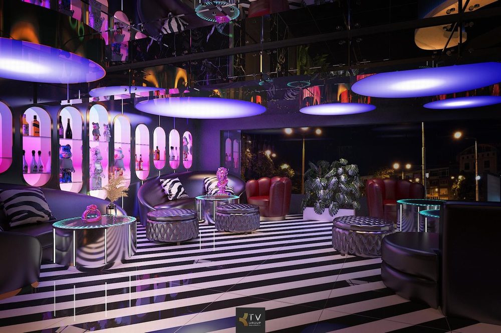 Thiết kế phòng karaoke KTV hiện đại với hệ trần ánh sáng nghệ thuật và bố trí nội thất hợp lý trong dịch vụ thi công karaoke trọn gói kèm gói PCCC. 