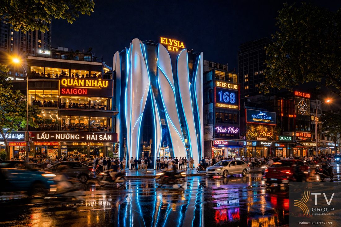 Mẫu thiết kế mặt tiền karaoke KTV phong cách futuristic với kiến trúc uốn cong hiện đại, hệ đèn LED đổi màu chạy viền nổi bật về đêm. Không gian ánh sáng sang trọng, phản chiếu mặt đường ướt tạo hiệu ứng thị giác ấn tượng, giúp tăng nhận diện thương hiệu và thu hút khách hàng 