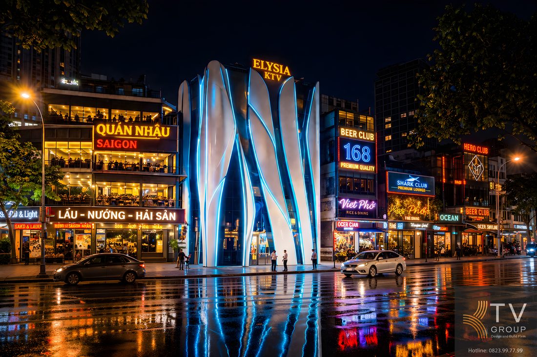 Mặt tiền karaoke Elysia KTV thiết kế thi công hiện đại với hình khối uốn cong kết hợp đèn LED nổi bật, tạo không gian giải trí sang trọng giữa phố đêm đông đúc, thu hút khách hàng và tăng nhận diện thương hiệu hiệu quả. 
