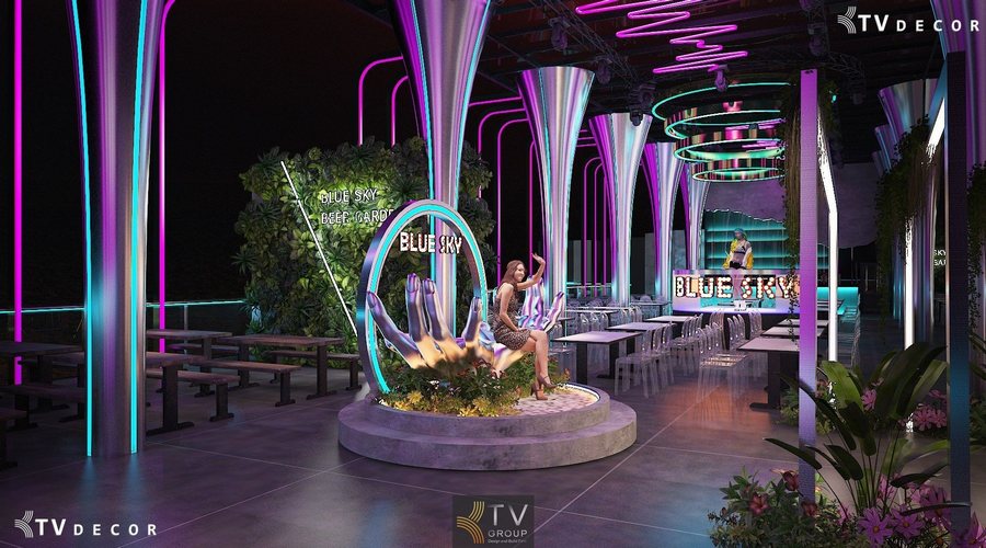 Không gian Beer Garden với ánh sáng Neon, cột thép cong và mảng tường cây xanh tạo điểm nhấn hiện đại" 