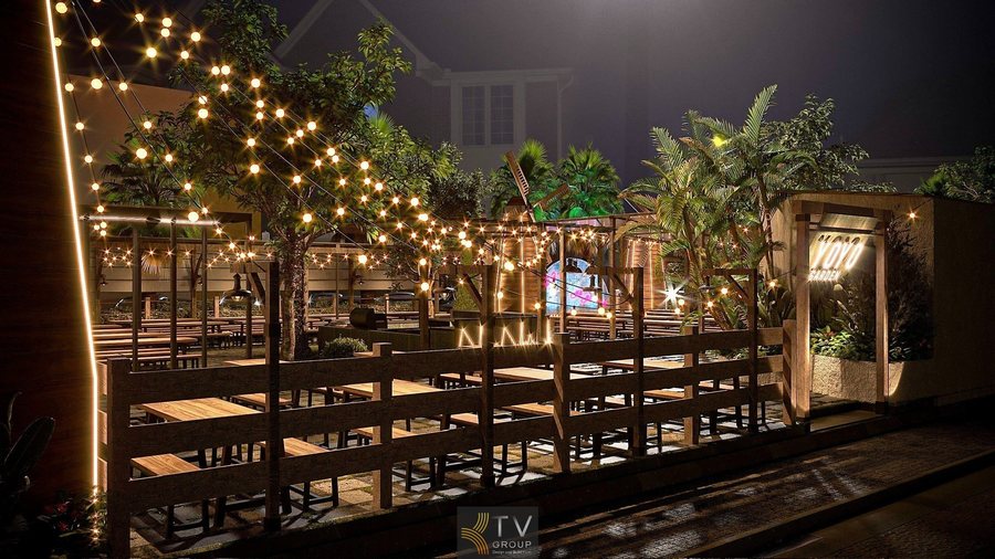 “Nhà hàng ngoài trời với ánh sáng vàng tạo cảm giác ấm cúng và thư giãn.”  “Không gian Garden Restaurant lung linh với đèn dây và cây xanh về đêm.” 3