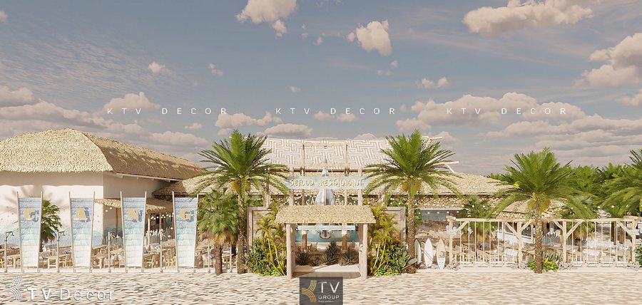 “Mặt tiền nhà hàng hải sản Hải Cảng Seafood phong cách resort biển tại Phan Thiết.”  “Thiết kế kiến trúc mái lá tropical cho nhà hàng ven biển Phan Thiết.”  “Không gian mặt trước nhà hàng seafood với hàng dừa và cổng gỗ trang trí.”  “Mẫu thiết kế nhà hàng hải sản view biển với bàn ghế ngoài trời và mái lá.”  “Phối cảnh mặt tiền nhà hàng Hải Cảng Seafood Phan Thiết phong cách nghỉ dưỡng.” 